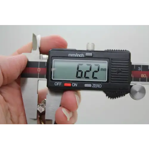 Signed 14k W.G. .60ctw DIAMOND FANCY STUD earrings