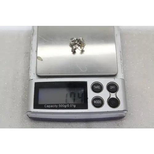 Signed 14k W.G. .60ctw DIAMOND FANCY STUD earrings