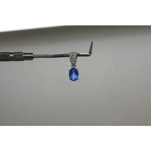 Signed 14k W.G. BLUE TOPAZ & WHITE SAPPHIRE OVAL DROP pendant