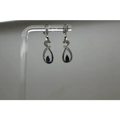 Signed 14k W.G. BLUE TOPAZ & WHITE SAPPHIRE TWIST DANGLE earrings