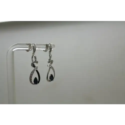 Signed 14k W.G. BLUE TOPAZ & WHITE SAPPHIRE TWIST DANGLE earrings