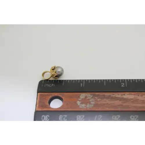 Signed 14k Y.G. FLORAL DESIGN GREY PEARL pendant