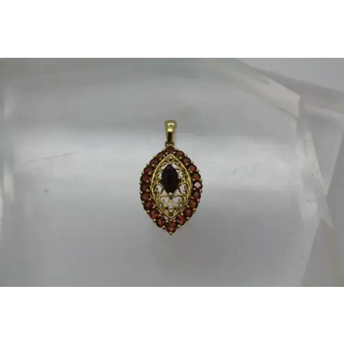 Signed 14k Y.G. GARNET FILIGREE HALO pendant #