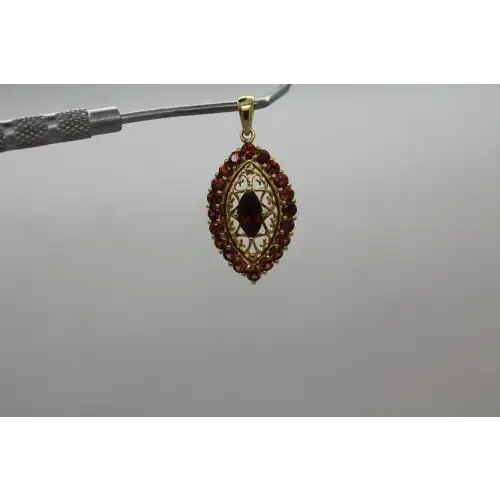 Signed 14k Y.G. GARNET FILIGREE HALO pendant #
