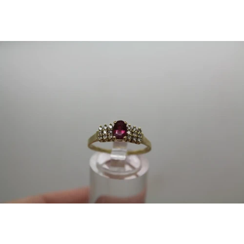 Signed 14k Y.G. Oval Cut RUBY & .18ctw DIAMOND ring size 8.75