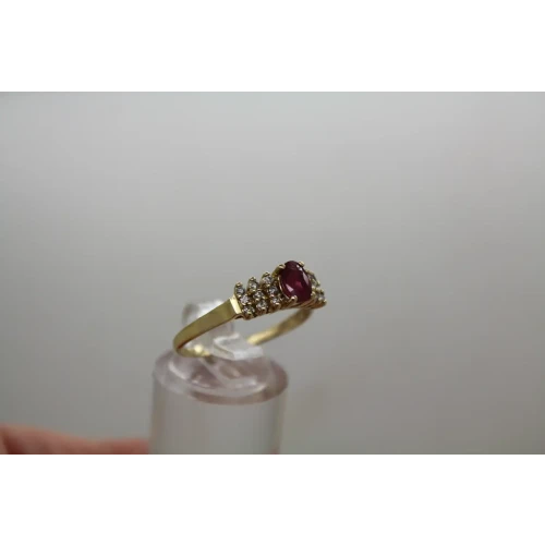 Signed 14k Y.G. Oval Cut RUBY & .18ctw DIAMOND ring size 8.75
