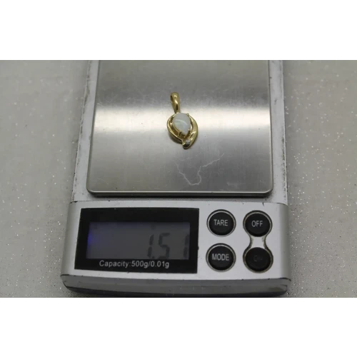 Signed 14k Y.G. Pear Cut OPAL & DIAMOND accent LEAF DESIGN pendant