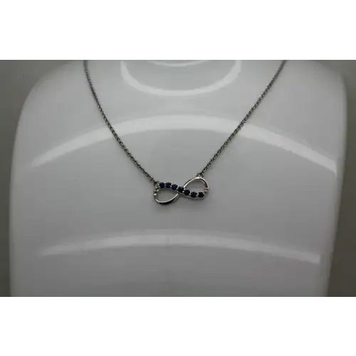 Signed .925 S.S. BLUE TOPAZ & DIAMOND acc. INFINITY necklace (2)
