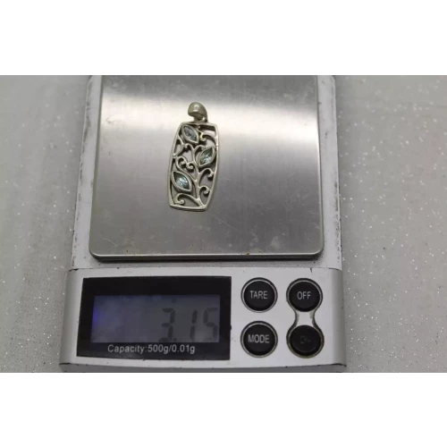 Signed .925 S.S. BLUE TOPAZ VINING LEAF DESIGN RECTANGLE pendant