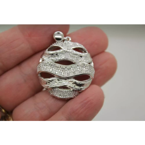 Signed .925 S.S. DIAMOND TEXTURED OPEN WORK WAVE CIRCLE pendant