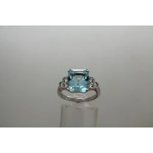 Signed .925 S.S. Emerald Cut LARGE BLUE CZ with accents ring size 8