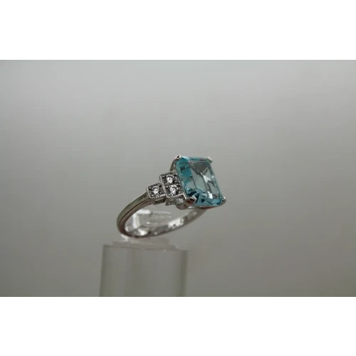 Signed .925 S.S. Emerald Cut LARGE BLUE CZ with accents ring size 8
