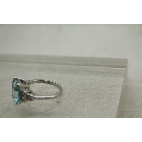 Signed .925 S.S. Emerald Cut LARGE BLUE CZ with accents ring size 8