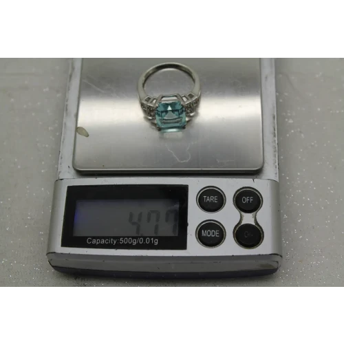 Signed .925 S.S. Emerald Cut LARGE BLUE CZ with accents ring size 8