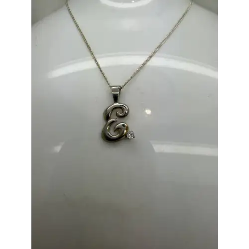 Signed .925 S.S. FANCY INITAL E CZ pendant necklace.