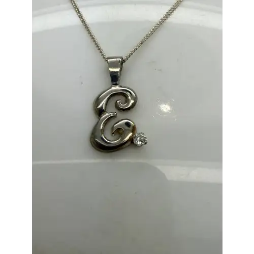 Signed .925 S.S. FANCY INITAL E CZ pendant necklace.