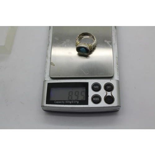 Signed .925 S.S. LONDON BLUE TOPAZ TWISTED CABLE ring size 6.75 #