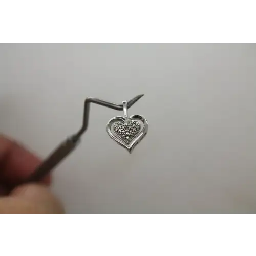 Signed A .925 S.S. STUDDED DIAMOND ACCENT HEART pendant
