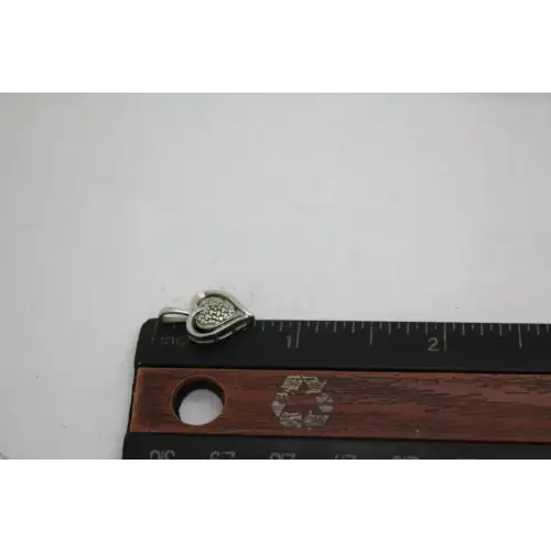 Signed A .925 S.S. STUDDED DIAMOND ACCENT HEART pendant