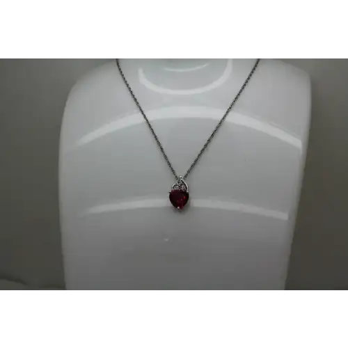 Signed AU .925 S.S. Heart Cut RUBY & DIAMOND acc. HEART necklace