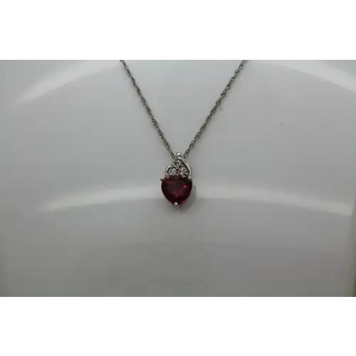 Signed AU .925 S.S. Heart Cut RUBY & DIAMOND acc. HEART necklace