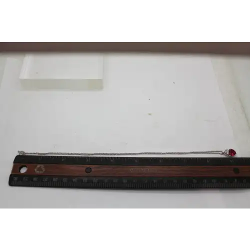 Signed AU .925 S.S. Heart Cut RUBY & DIAMOND acc. HEART necklace