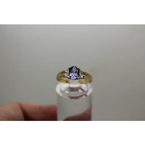 Signed CI 14k Y.G. TANZANITE & .12ctw DIAMOND ring size 6.75