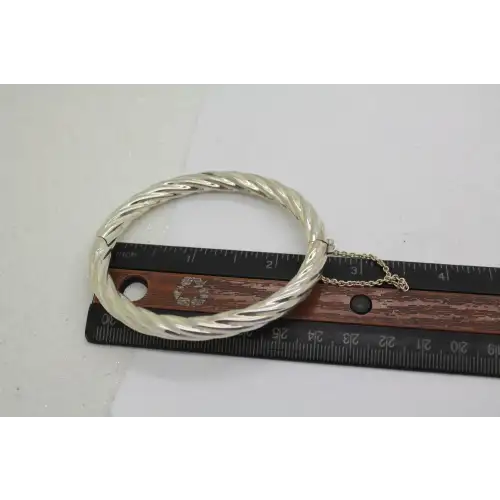 Signed CI .925 S.S. TWIST DESIGN HINGED BANGLE