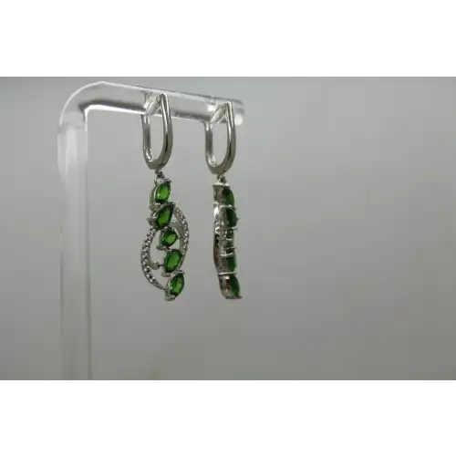 Signed DK .925 S.S. PERIDOT & DIAMOND SWIRL DESIGN dangle earrings # (2)