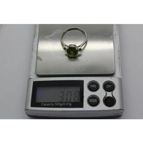Signed DK .925 S.S. PERIDOT EMERALD SOLITAIRE w/ acc. size 10.75 #