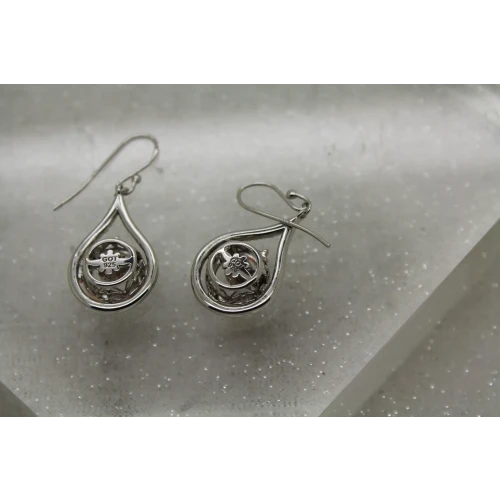 Signed GOT  .925 S.S. TWO TONE STONE IN MOTION TEARDROP DANGLES