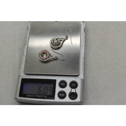 Signed GOT  .925 S.S. TWO TONE STONE IN MOTION TEARDROP DANGLES