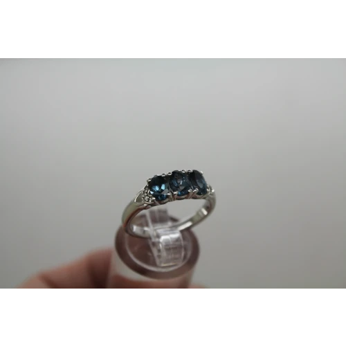 Signed MCGI .925 S.S. LONDON BLUE TOPAZ 3 Stone ring size 7.75 #