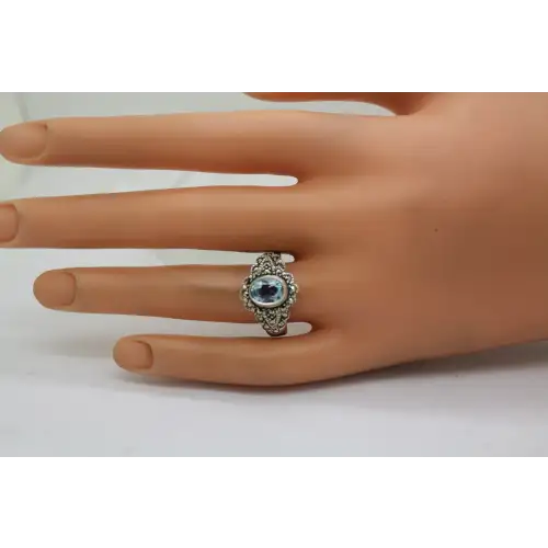 Signed NF .925 S.S. Oval BLUE TOPAZ & MARCASITE ring size 8.75