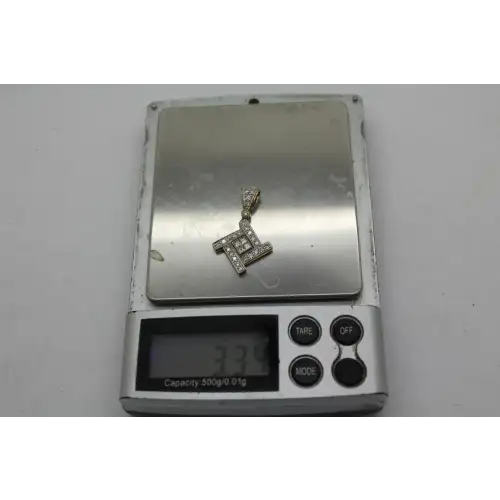 Signed OD 14k Y.G. GEOMETRIC DESIGN .65ctw DIAMOND pendant