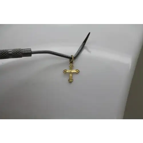 Signed OR 14k Y.G. PETITE LASER CUT CROSS pendant