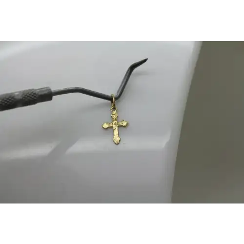 Signed OR 14k Y.G. PETITE LASER CUT CROSS pendant