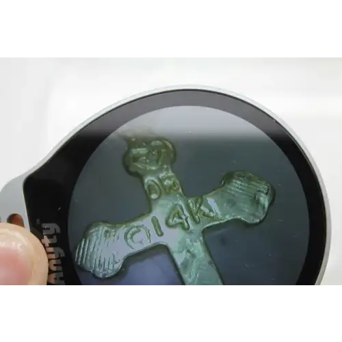 Signed OR 14k Y.G. PETITE LASER CUT CROSS pendant