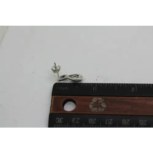 Signed R. .925 S.S. LAB GROWN ALEXANDRITE LOOP DESIGN dangles #