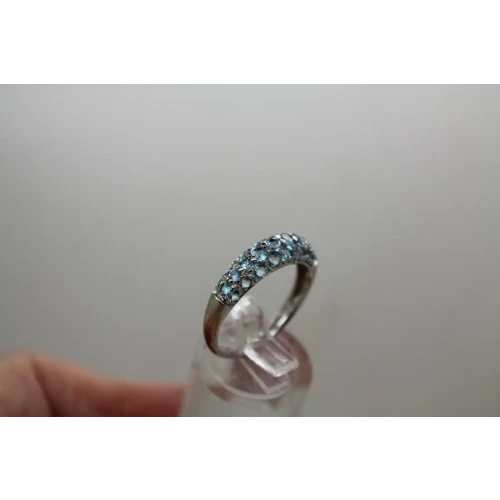 Signed Rodium Plated 10k Y.G. BLUE TOPAZ BAND ring size 8.25