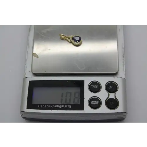 Signed ROYAL 14k Y.G. BLUE SAPPHIRE & DIAMOND HALO pendant # (5)