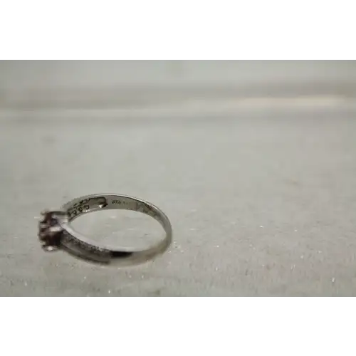 Signed STS 14k W.G. PINK TOPAZ FLOWER DESIGN w/ acc. ring size 6.75