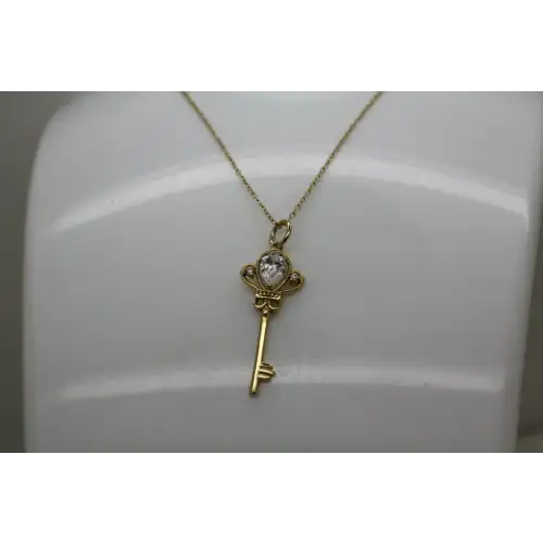 Signed SU gold over .925 S.S. CZ SKELETON KEY pendant necklace