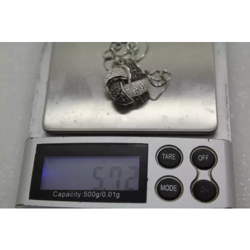 Signed SUN .925 S.S. BLACK & WHITE DIAMOND KNOT DESIGN necklace 18