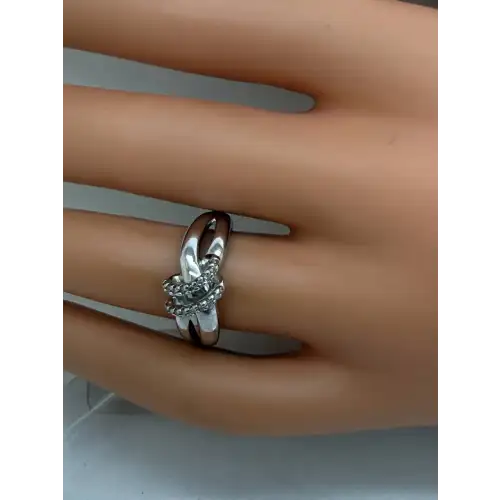 Signed SUN .925 S.S. CRISSCROSS LOOP DESIGN DIAMOND ring size 6.75