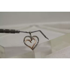 Signed SUN .925 S.S. DIAMOND TWO TONE DOUBLE HEART pendant