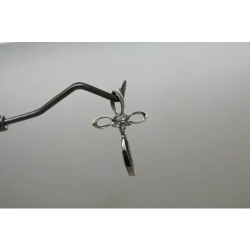 Signed TAJ 10k W.G. DIAMOND LOOP DESIGN CROSS pendant