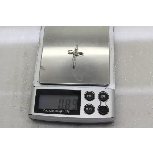 Signed TAJ 10k W.G. DIAMOND LOOP DESIGN CROSS pendant