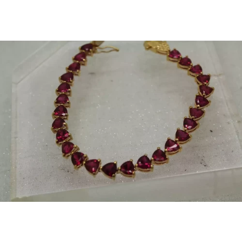 Signed UTC gold over .925 S.S. TRILLION CUT PINK SAPPHIRE bracelet 8