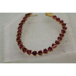 Signed UTC gold over .925 S.S. TRILLION CUT PINK SAPPHIRE bracelet 8